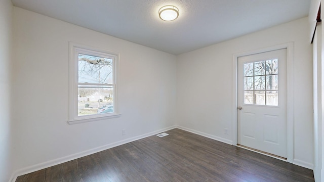 interior space featuring dark hardwood / wood-style flooring