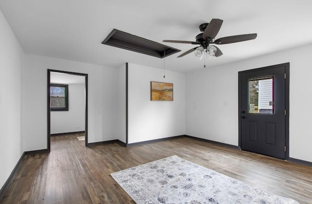 spare room with wood-type flooring and ceiling fan