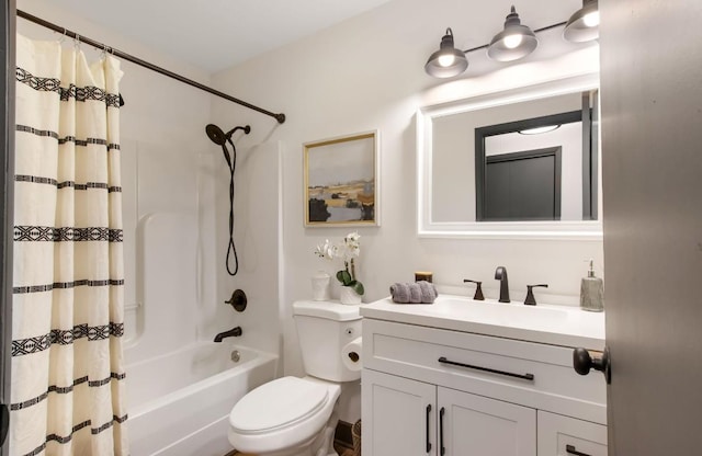 full bathroom with vanity, shower / bath combination with curtain, and toilet