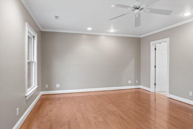 unfurnished room with ceiling fan, ornamental molding, and light wood-type flooring