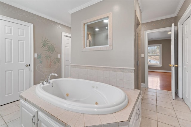 bathroom featuring crown molding, tiled bath, and tile patterned flooring