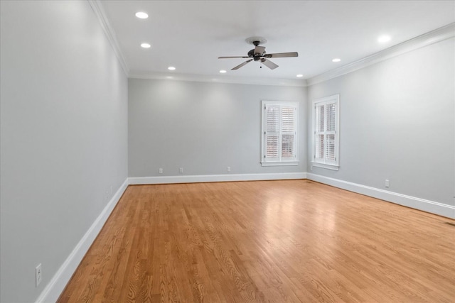 empty room with crown molding, ceiling fan, and light wood-type flooring