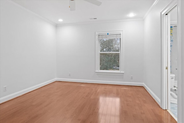 unfurnished room featuring ceiling fan, ornamental molding, and light hardwood / wood-style floors