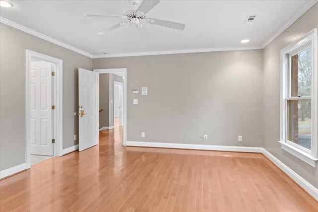 unfurnished room featuring crown molding, ceiling fan, and light wood-type flooring