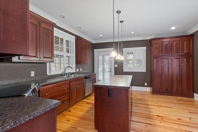 kitchen with sink, a center island, light hardwood / wood-style flooring, dishwasher, and pendant lighting