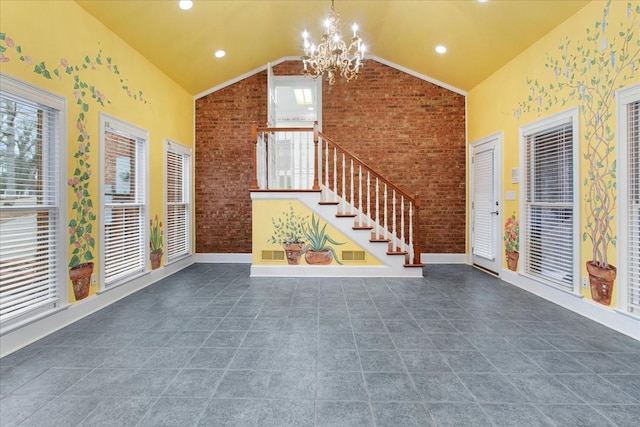 interior space featuring lofted ceiling and a notable chandelier