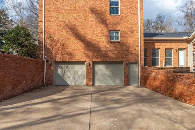 view of side of property featuring a garage