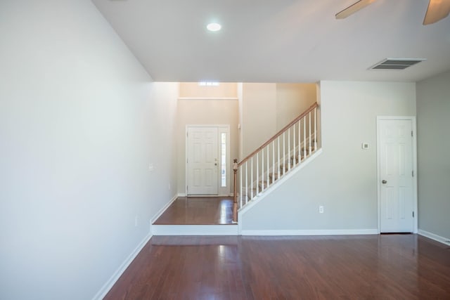 foyer entrance featuring ceiling fan and dark hardwood / wood-style flooring