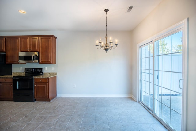 kitchen featuring light stone countertops, decorative light fixtures, a notable chandelier, black range with electric stovetop, and light tile patterned flooring