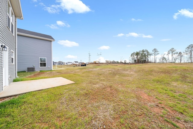 view of yard with a patio and cooling unit
