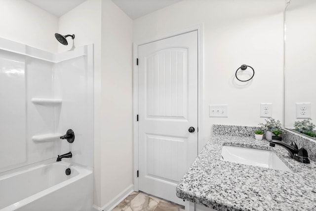 full bathroom with shower / bath combination, baseboards, marble finish floor, and vanity