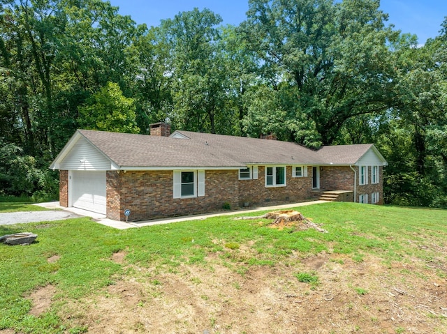 ranch-style house featuring a front lawn and a garage