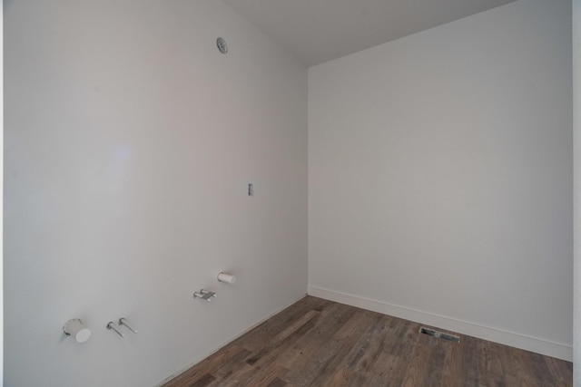 empty room featuring dark hardwood / wood-style floors