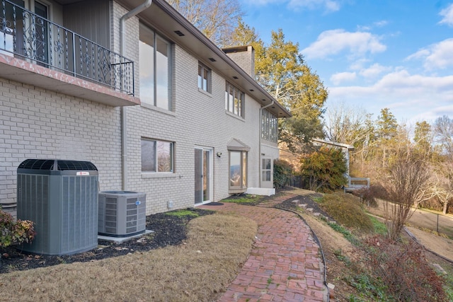 view of home's exterior with cooling unit