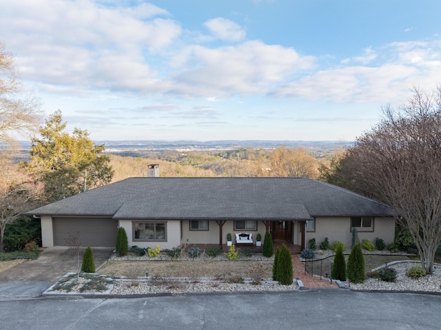 single story home featuring a garage