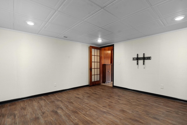 empty room featuring dark hardwood / wood-style flooring