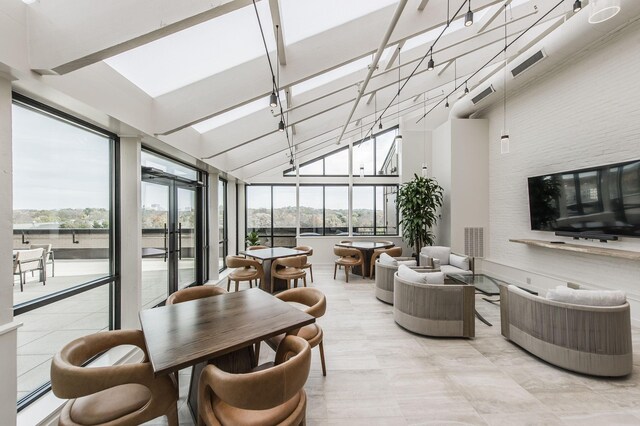 sunroom / solarium with lofted ceiling