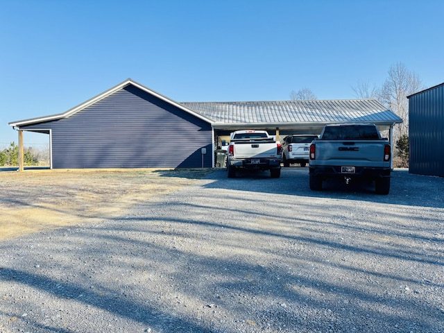 exterior space with a carport