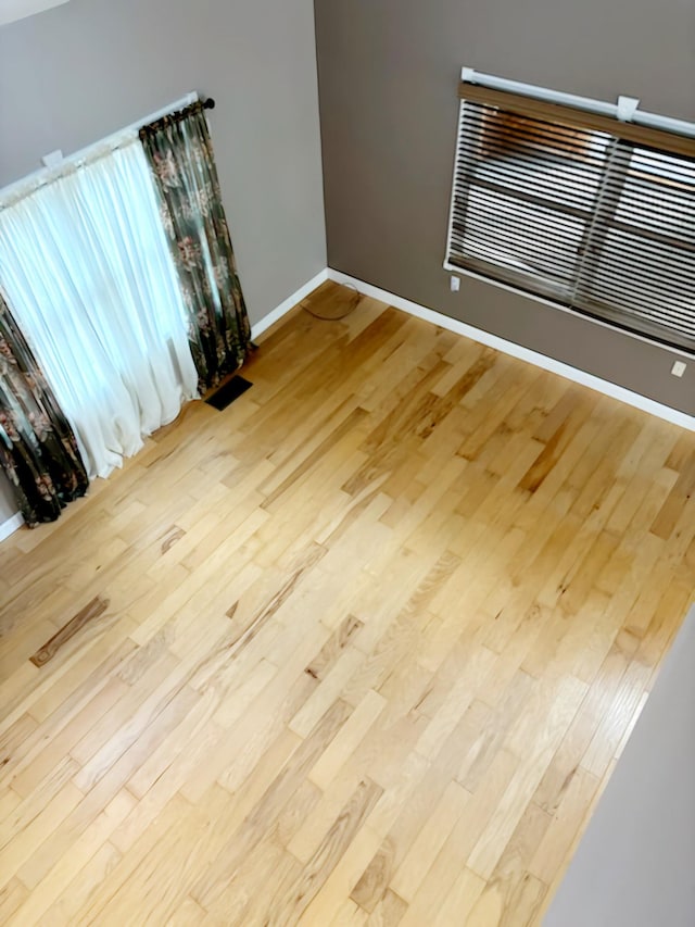 empty room featuring light wood-type flooring