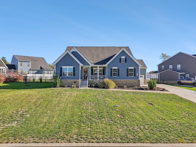 view of front of property featuring a porch and a front yard