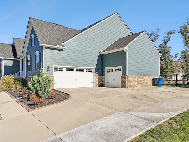 view of property exterior with a garage