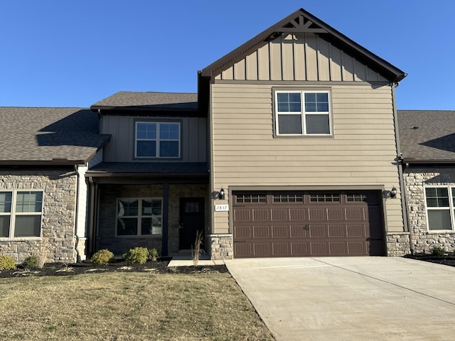 craftsman inspired home with a garage