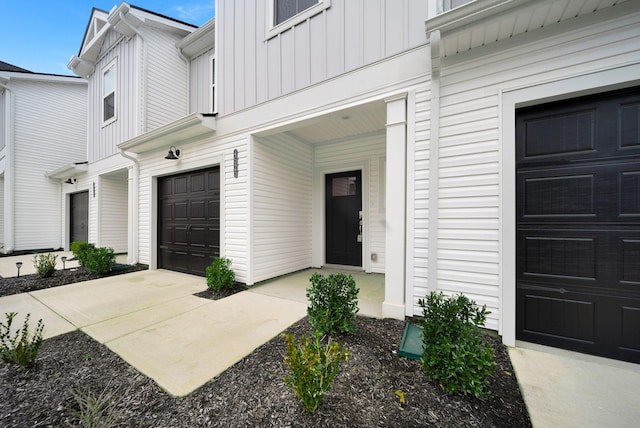 doorway to property featuring a garage