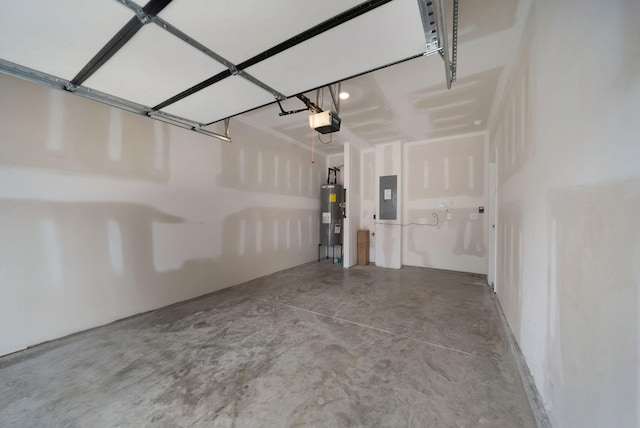 garage featuring electric panel, a garage door opener, and water heater