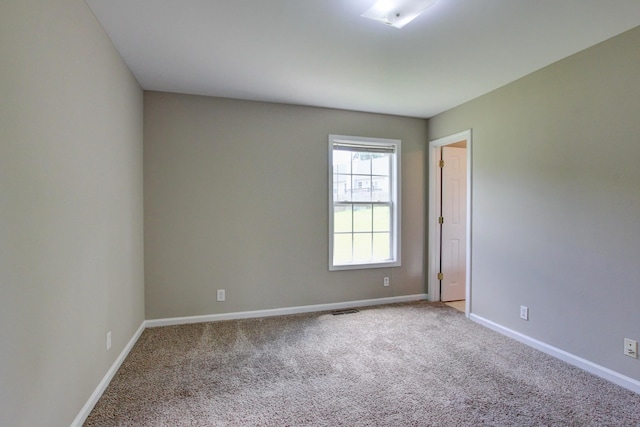 view of carpeted spare room