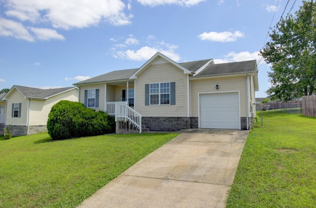 single story home with a front yard, a porch, and a garage