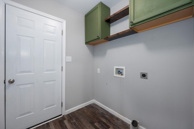 clothes washing area featuring electric dryer hookup, dark wood-type flooring, hookup for a washing machine, and cabinets