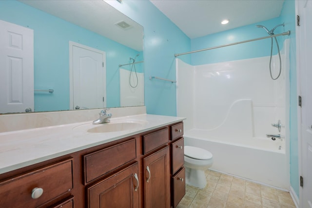 full bathroom featuring vanity, bathing tub / shower combination, and toilet