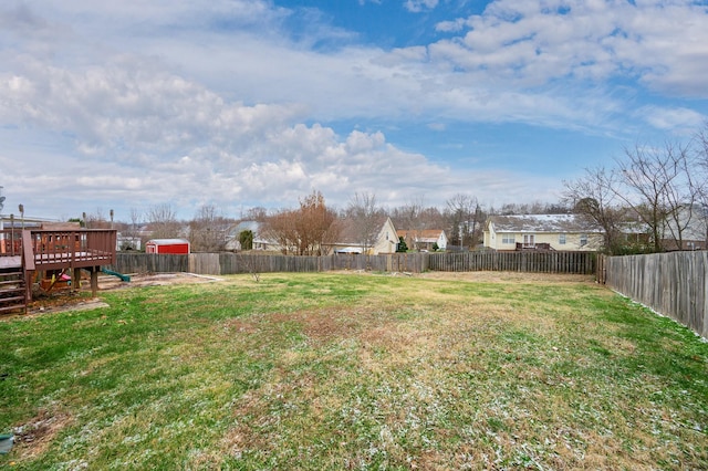 view of yard with a deck