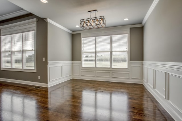 unfurnished dining area with crown molding and dark hardwood / wood-style floors