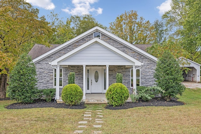 view of front of home with a front lawn and covered porch