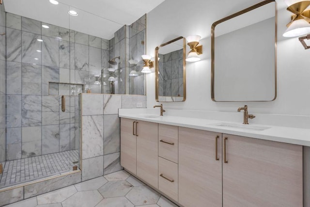 bathroom featuring vanity and a shower with shower door