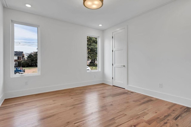 unfurnished room featuring light wood-type flooring