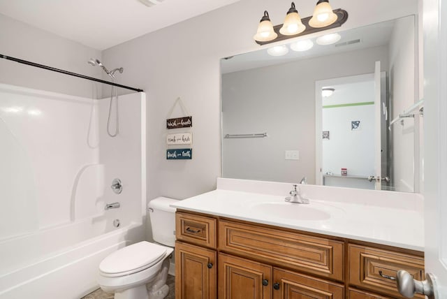 full bathroom with vanity, tub / shower combination, and toilet