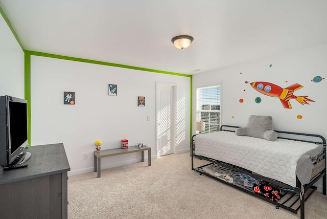 bedroom with light colored carpet