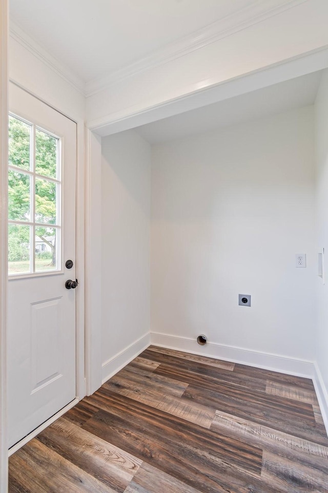 laundry room featuring hookup for an electric dryer, dark hardwood / wood-style floors, and crown molding