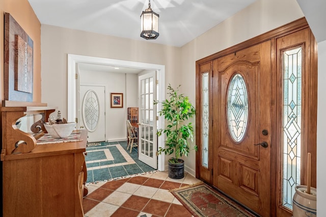 view of tiled entrance foyer