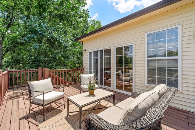 wooden terrace featuring outdoor lounge area