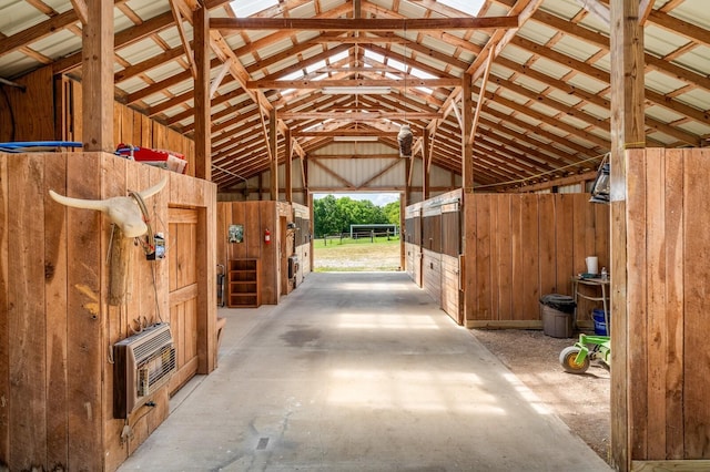 view of horse barn with heating unit