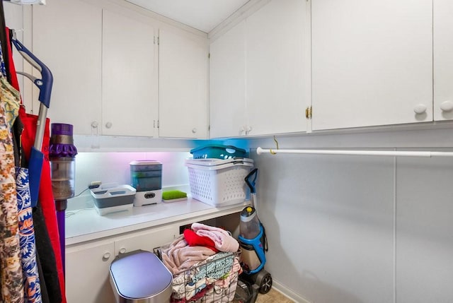 laundry room with crown molding