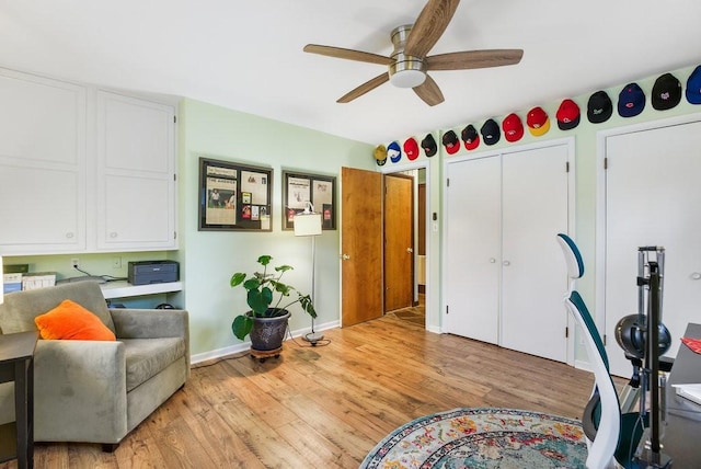 interior space with ceiling fan and light wood-type flooring