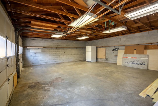 garage featuring white refrigerator