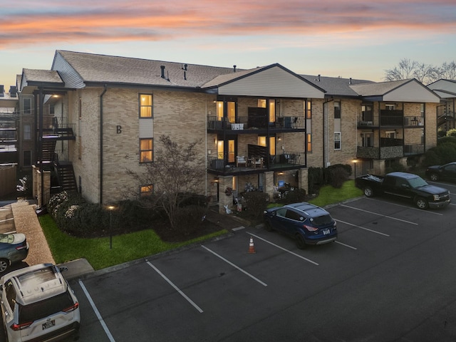 view of outdoor building at dusk