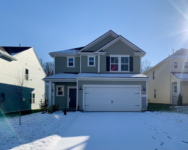 front of property with a garage