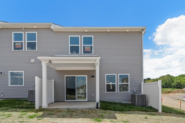 back of house featuring central AC unit and a patio