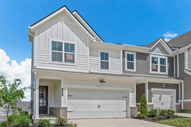 view of front of property with a garage